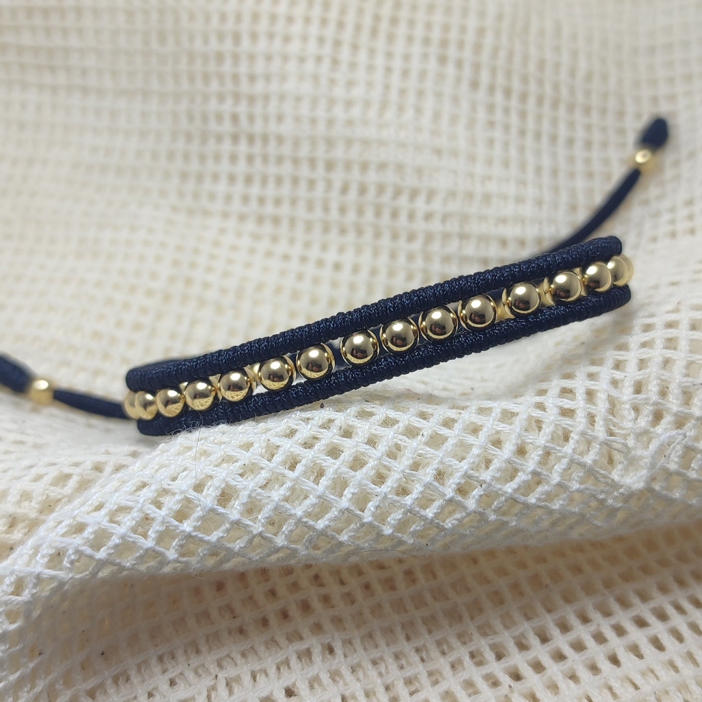 Pulsera tejida con Oro de 18kl