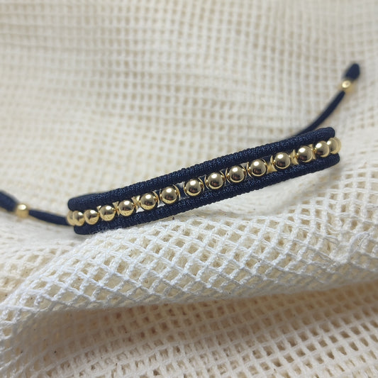 Pulsera tejida con Oro de 18kl